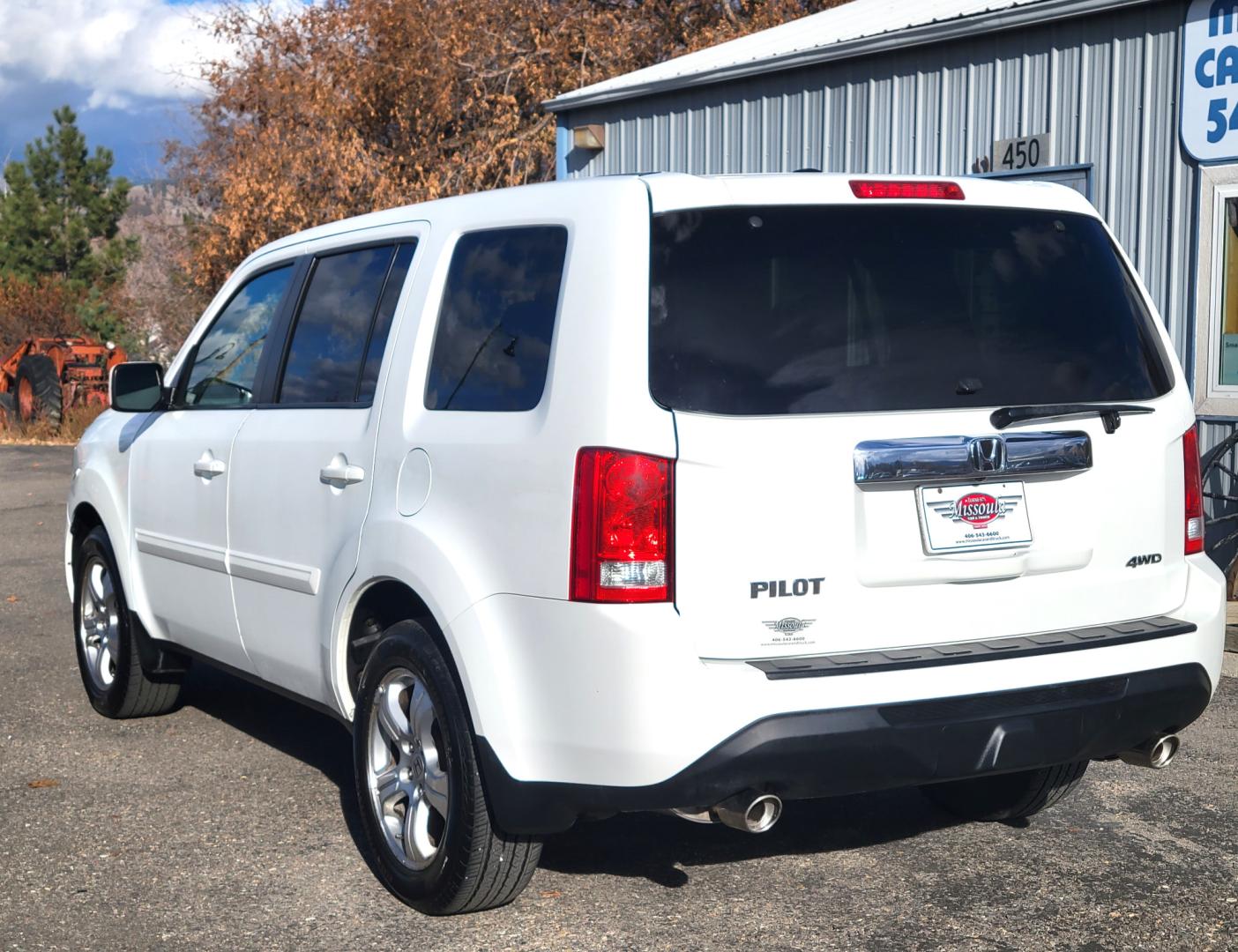 2015 White /Gray Honda Pilot EX-L AWD EX-L (5FNYF4H58FB) with an 3.5L V6 SOHC 24V engine, 5-Speed Automatic transmission, located at 450 N Russell, Missoula, MT, 59801, (406) 543-6600, 46.874496, -114.017433 - All Wheel Drive. Automatic Transmission. Power Heated Leather Seats. Power Sunroof. 3rd Row Seating. Air. Cruise. Tilt. Bluetooth. AM FM XM CD Player. Backup Camera. - Photo#7